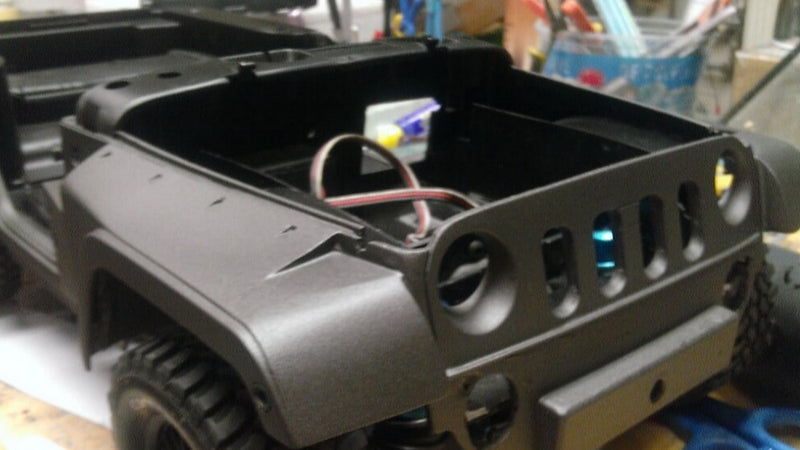 Check out this miniature Jeep Wrangler Black Hawk