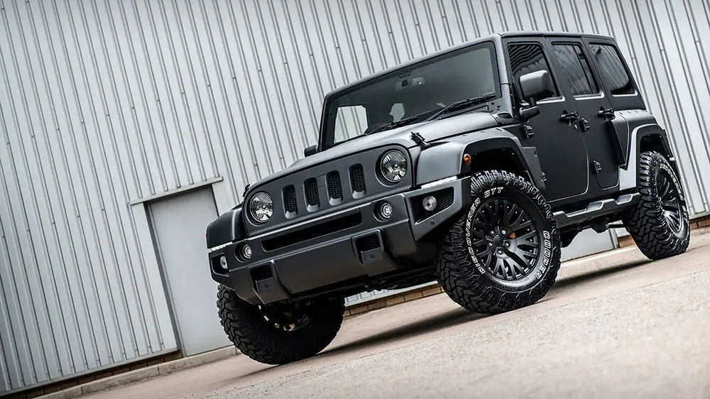 View from the press: We're obsessed with this Black Hawk Custom Jeep Wrangler - Chelsea Truck Company
