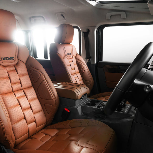 Ineos Grenadier 3D Modular Interior With the Tan leather seats, Steering Wheel, door panel , seat belt and instrument glove box By Kahn 