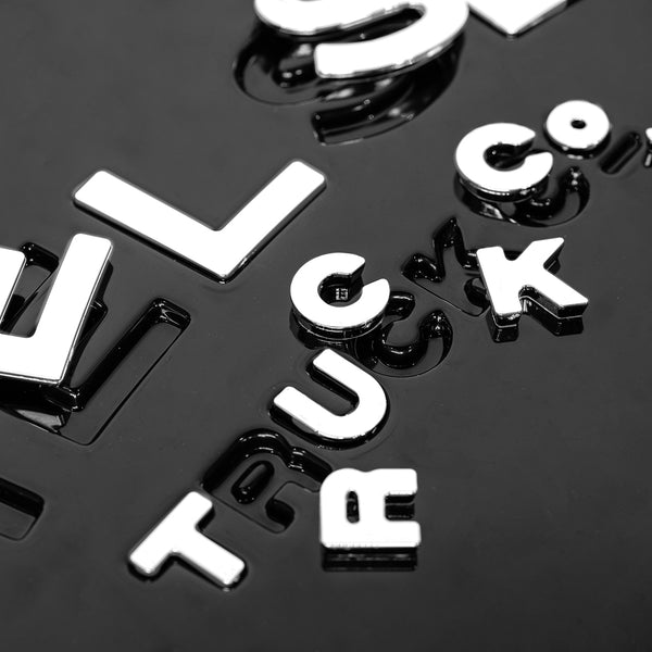 Durable lettering for embossed covers Tailored by Kahn