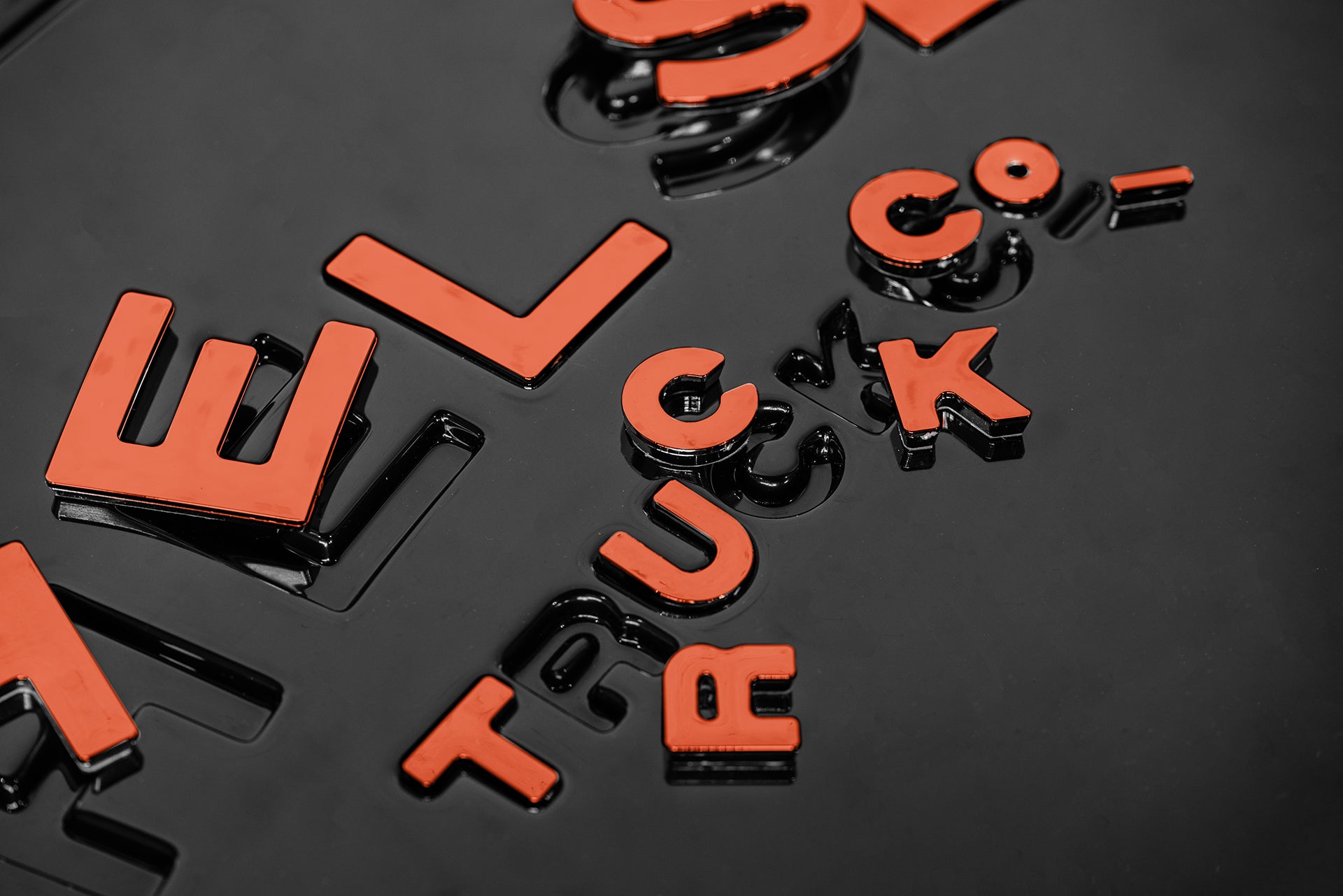Top Angle Of The Copper Lettering for Chelsea Truck Company Hard Spare Wheel Cover Tailored By Kahn