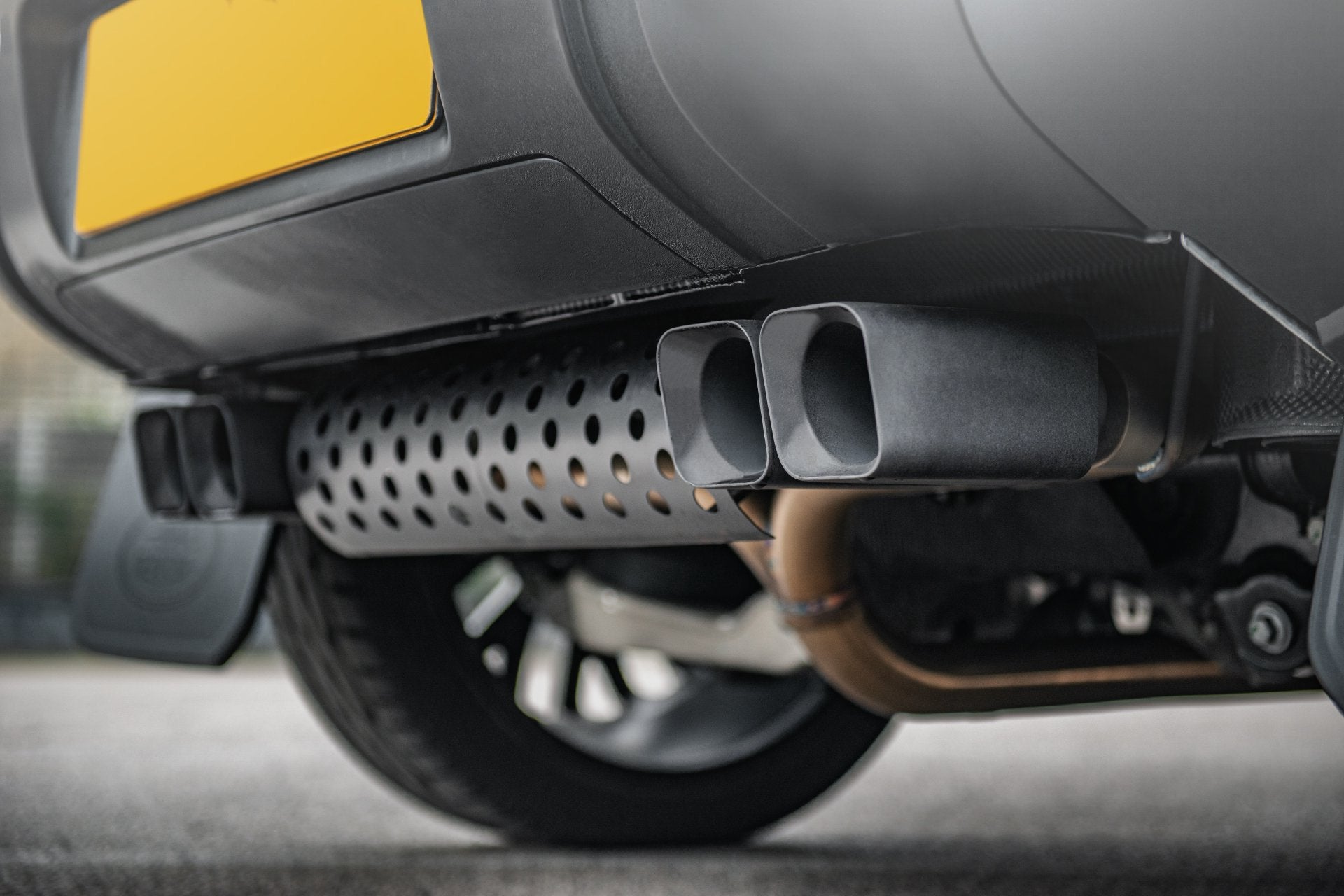 Wider View Of The Land Rover Defender 110 2.0 Petrol (2020-Present) Quad Exhaust System by Kahn